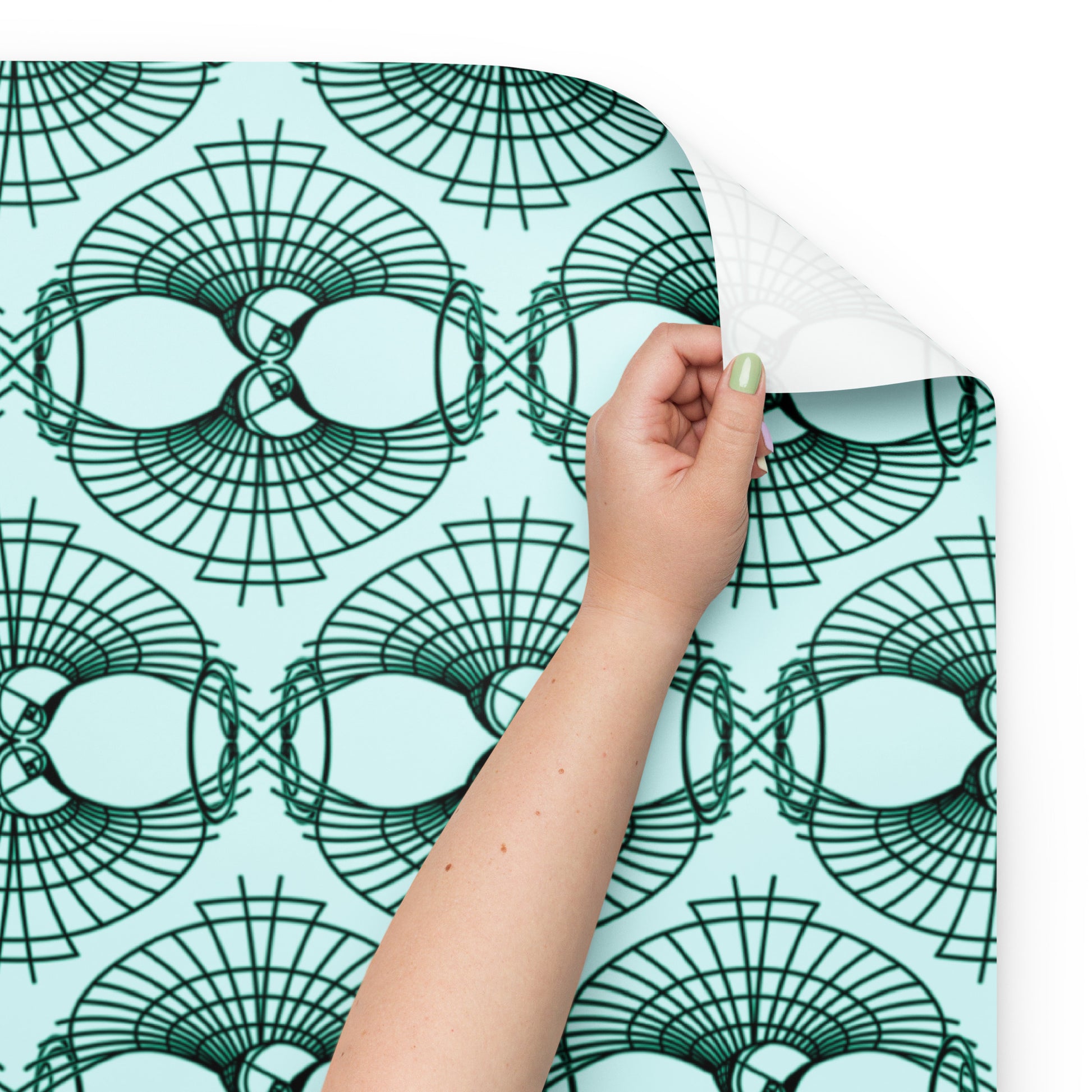 Close-up of the wrapping paper with model arm showing Rose Fibonacci Logo print